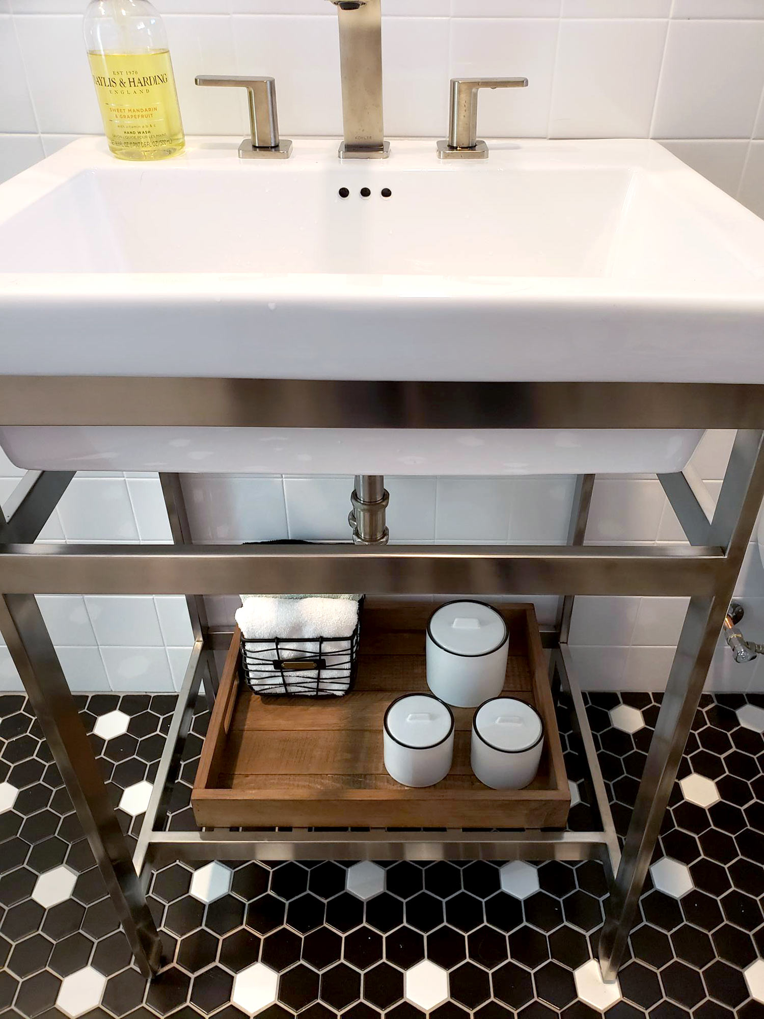 Under the sink storage was organized for use and function. Keeping things streamlined and minimal were what was important to this client.