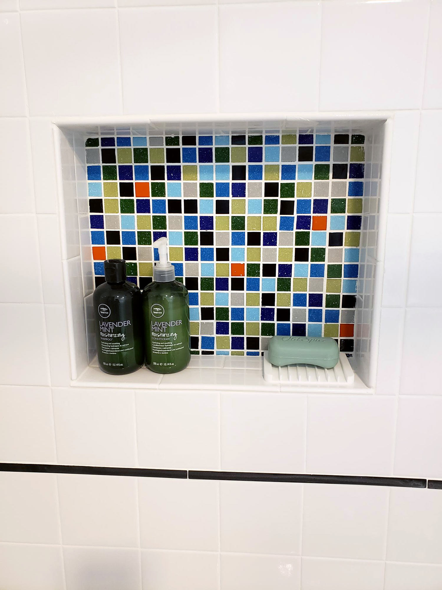The shower nook was organized for use and function. Keeping things streamlined and minimal were what was important to this client.